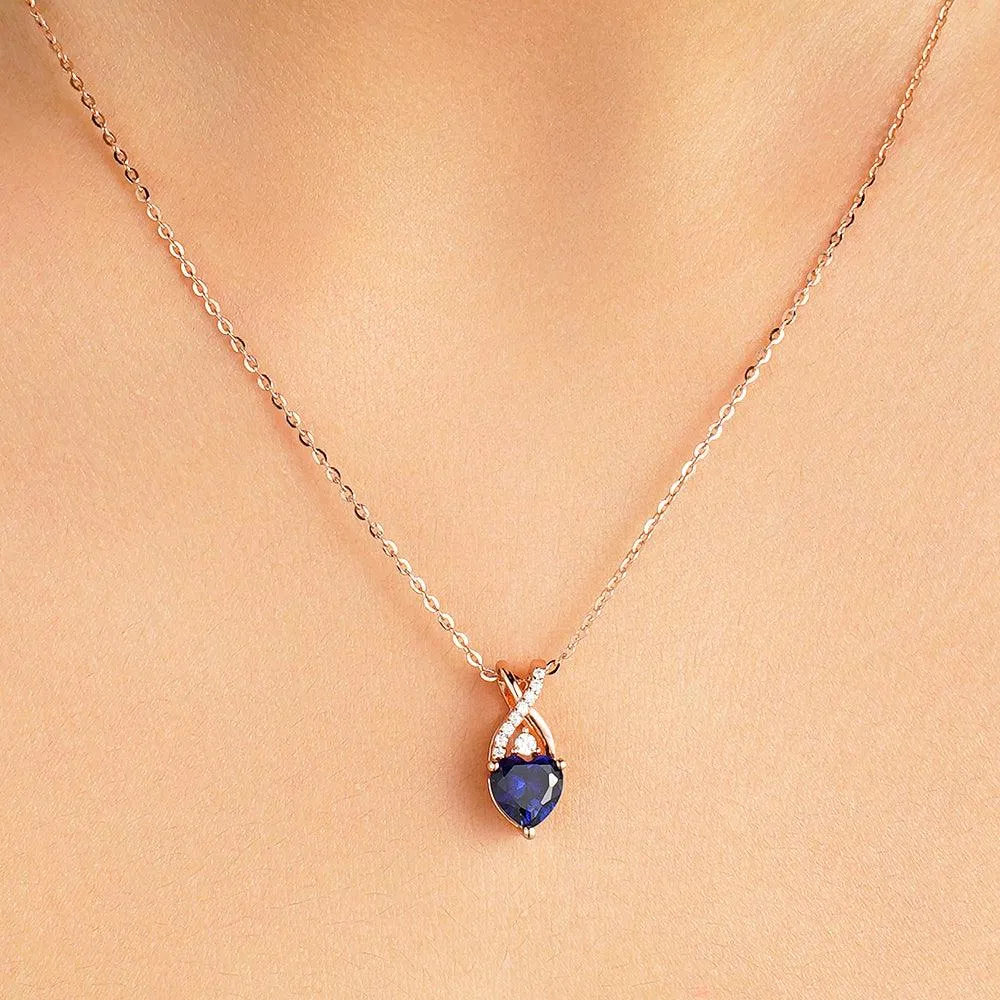 1.16 CT. Solitaire Heart Sapphire and White Sapphire Pendant